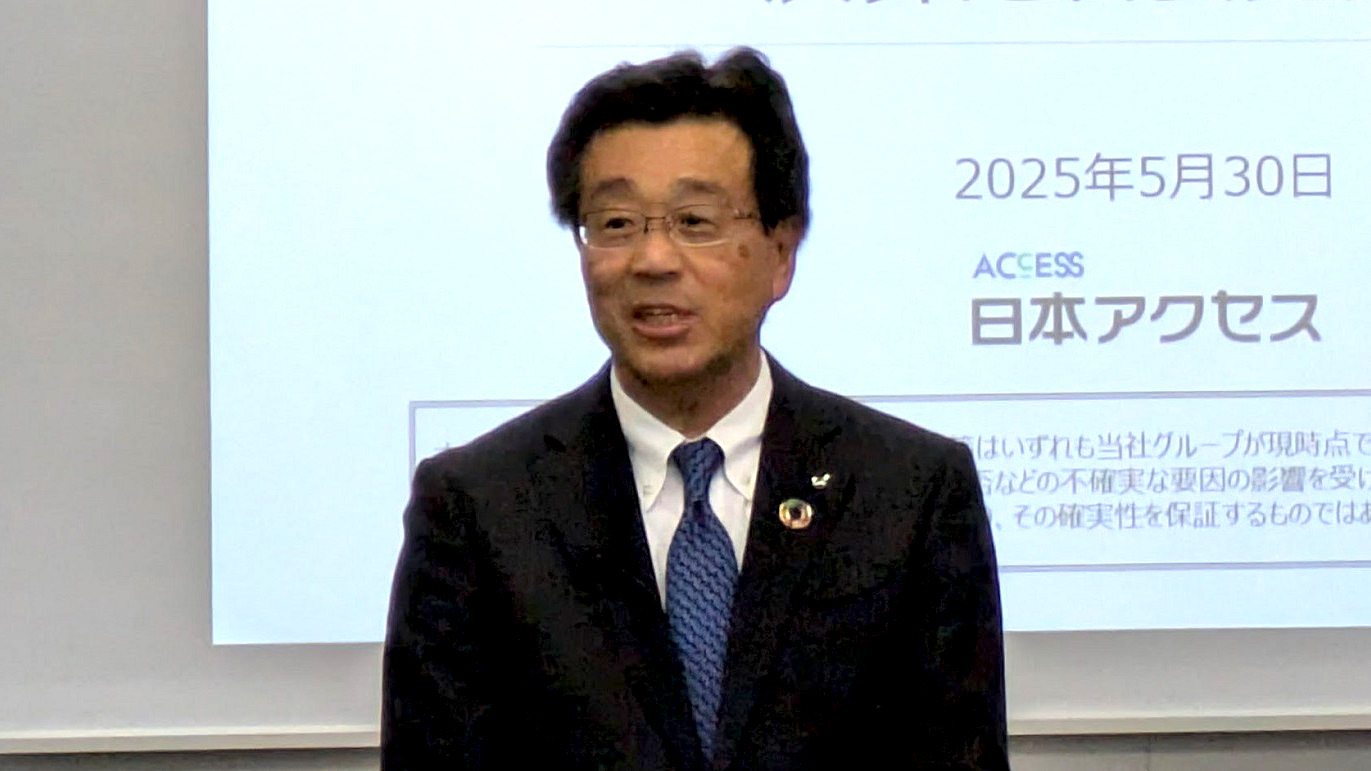 会見する服部真也日本アクセス社長