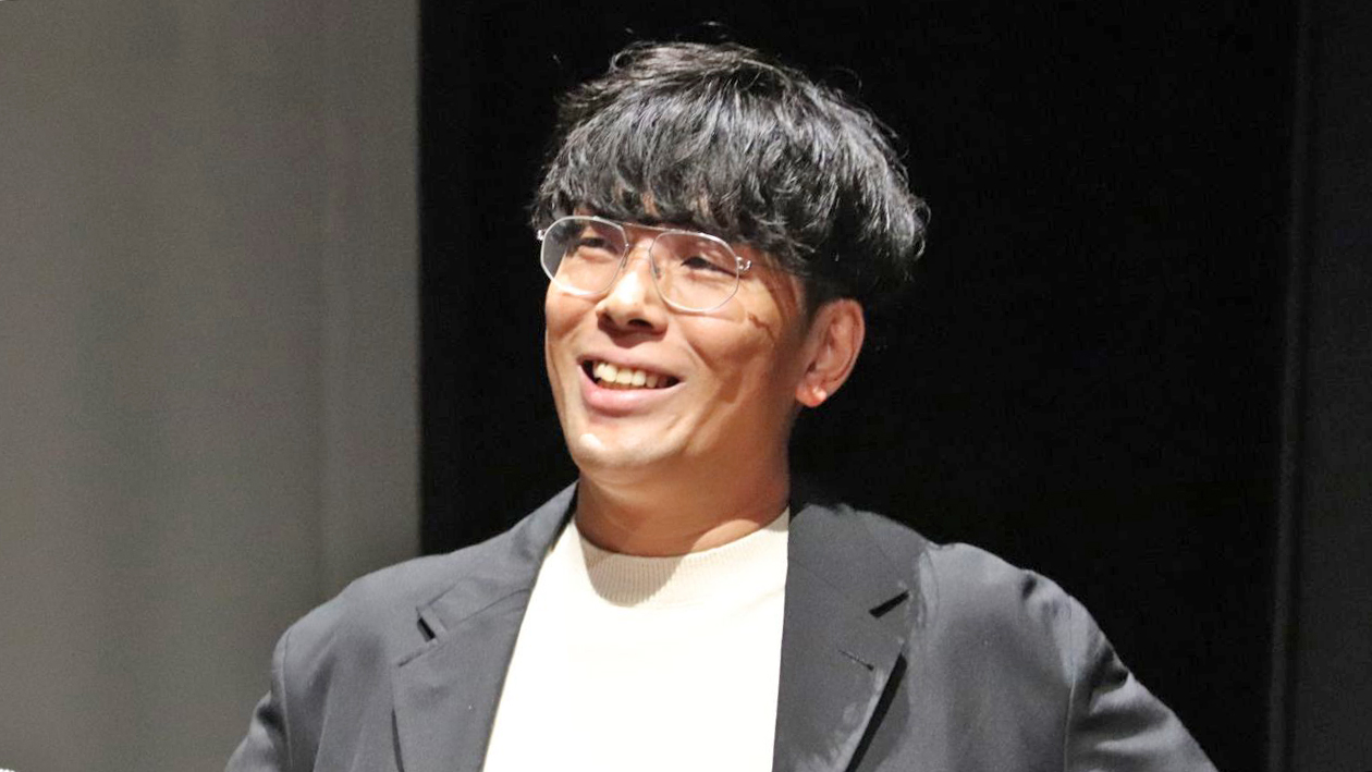 講演する丸山純社長